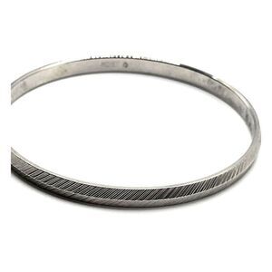 Monet Embossed Silver Metal Bangle Bracelet 7in